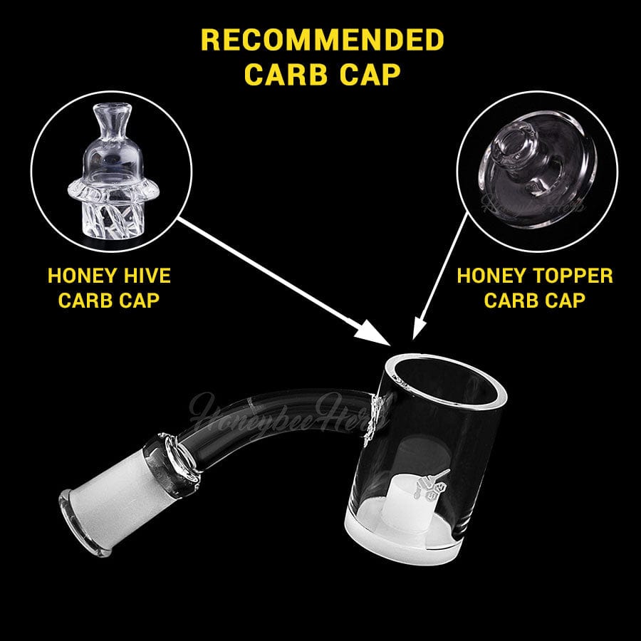 Angled close-up of the HONEY & MILK CORE REACTOR QUARTZ BANGER - 45Â° DEGREE | YL showing the clear 45° joint, cylindrical bucket and two recommended carb cap options on a black background