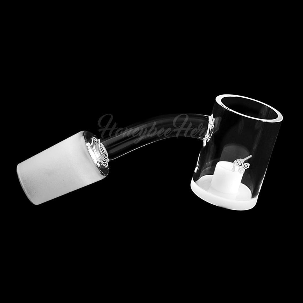 Angled close-up of the HONEY & MILK CORE REACTOR QUARTZ BANGER - 45Â° DEGREE | YL showing its curved clear neck and white frosted joint against a black background