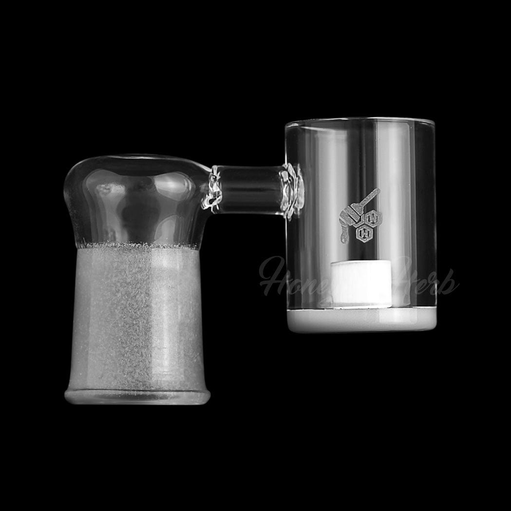 A studio shot of the HONEY & MILK CORE REACTOR SIDECAR QUARTZ BANGER - 90° DEGREE, displaying its clear glass construction and angled design.