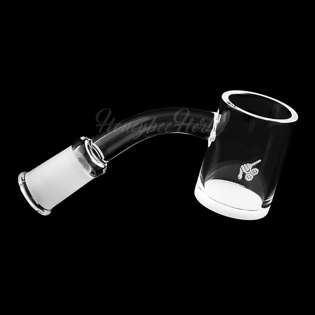 A 45-degree angled view of the HONEY & MILK QUARTZ BANGER, showcasing its clear quartz construction and rounded form.