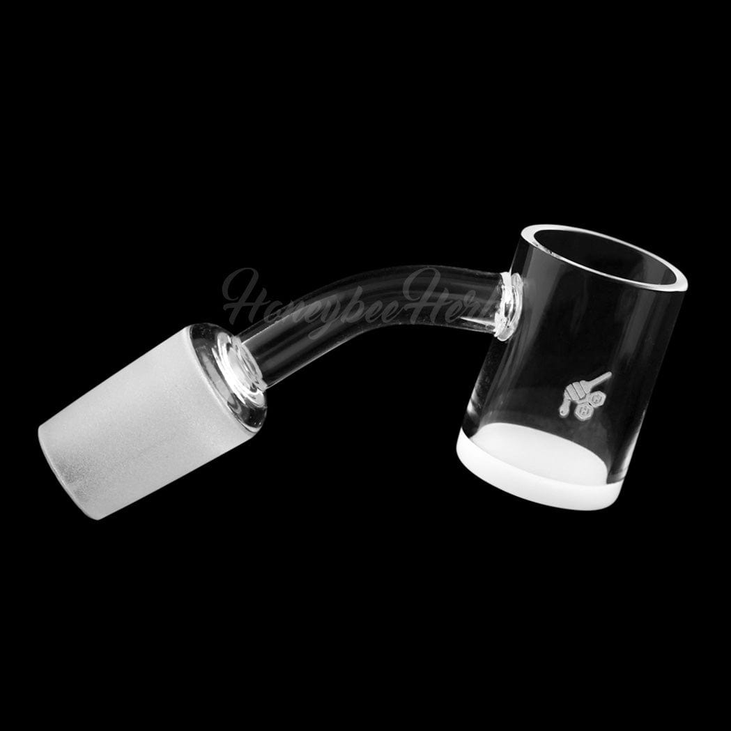A 45-degree angled view of the HONEY & MILK QUARTZ BANGER, showcasing its clear quartz construction and rounded form.