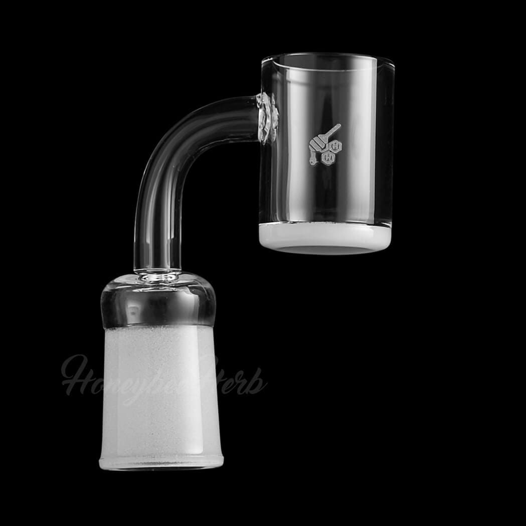 A close-up, angled view of the Honey & Milk Quartz Banger - 90° Degree  YL, showing its clean, reflective surface.