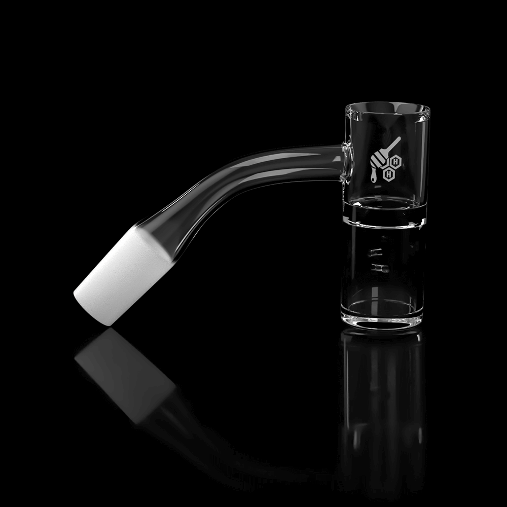 A 45-degree angle view of the HONEY WELL QUARTZ BANGER, showcasing its clear quartz construction and reflective surface.