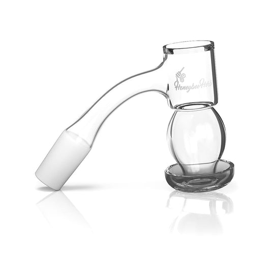 A studio shot of the HONEYSUCKLE BUBBLE QUARTZ BANGER - 45° DEGREE  BL, showing its angled quartz dish and clear glass construction.