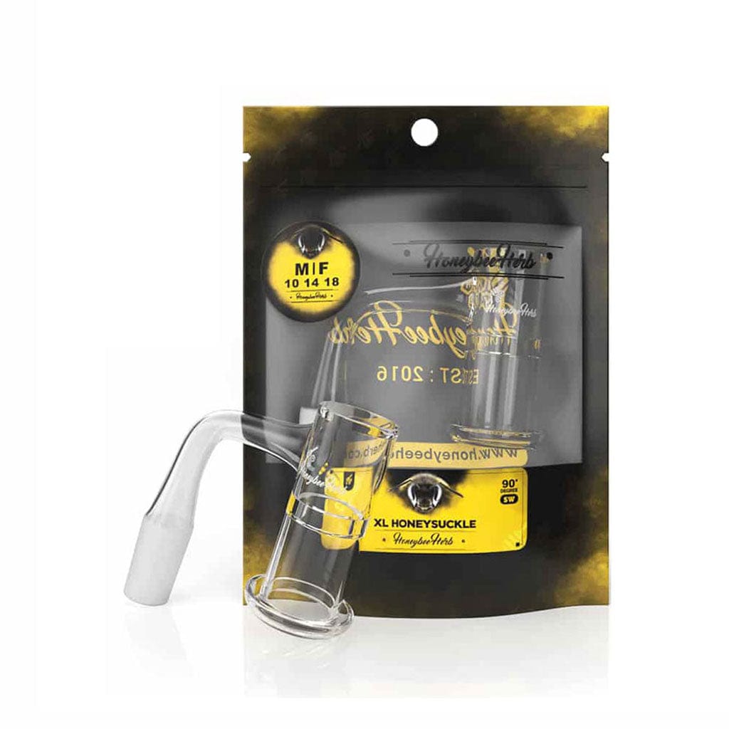 Clear studio shot of the Honeysuckle Xl Quartz Banger - 90Â° Degree | Bl resting angled in front of its black and yellow branded pouch, showing the 90° joint and open quartz cup.