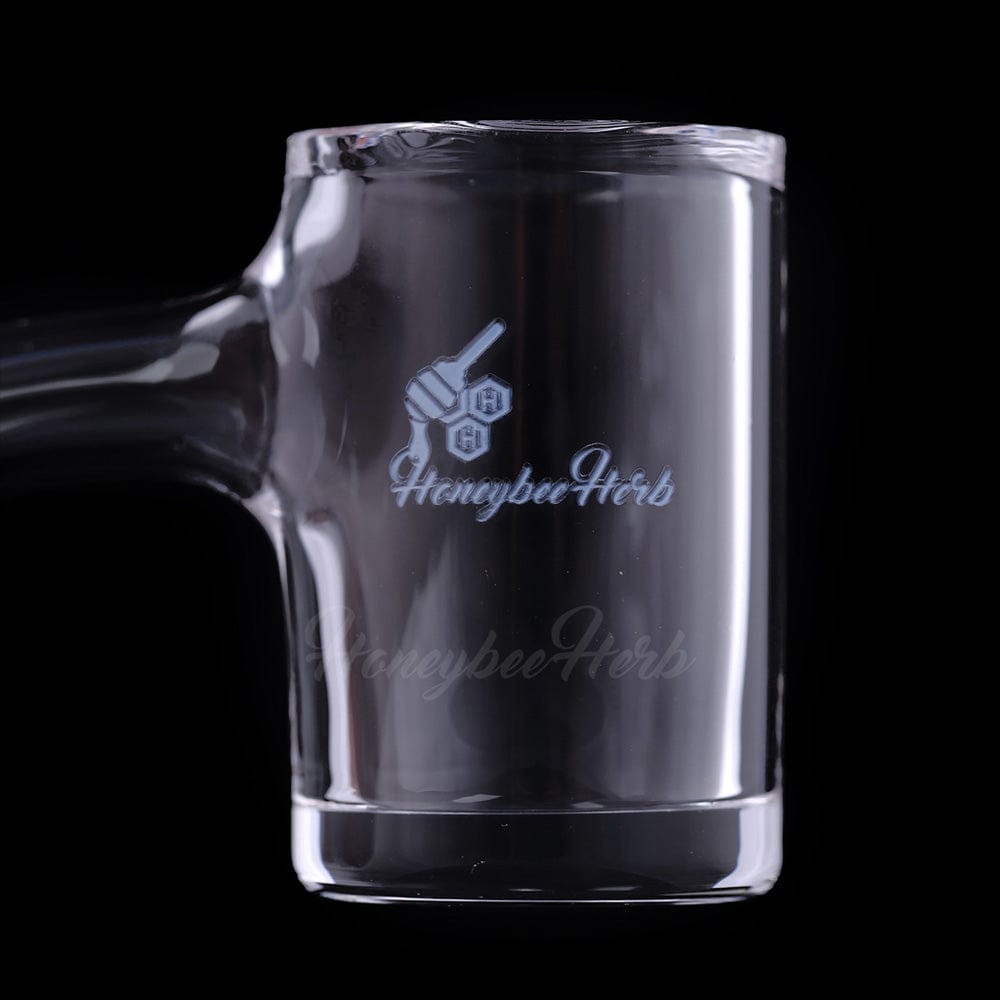 A 45-degree angled view of the Original Bevel Quartz Banger, displaying its clear, cylindrical shape against a dark background.