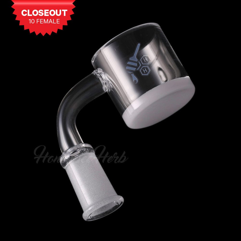 Angled close-up of the HONEY & MILK XL BEVEL QUARTZ BANGER - 90Â° DEGREE | YL showing its clear glass joint and white-bottomed quartz cup against a black background