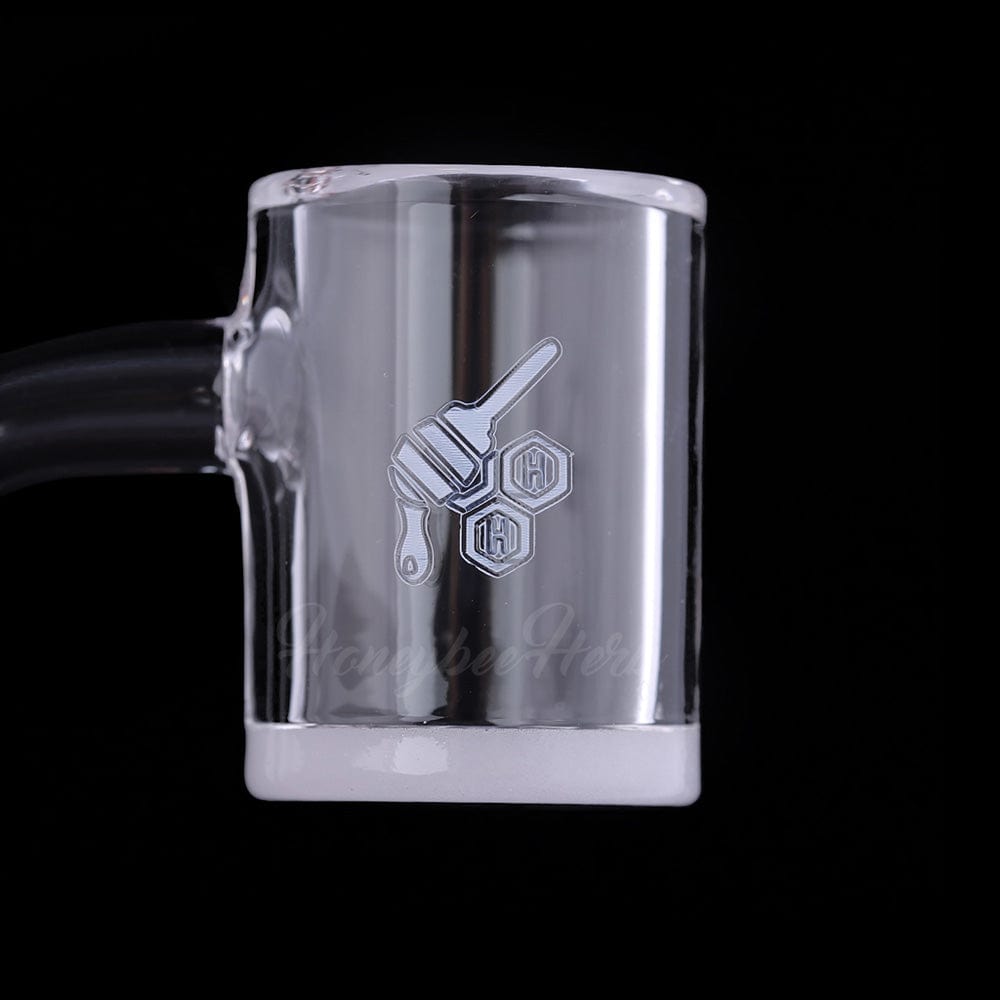 A slightly angled view of the HONEY & MILK BEVEL QUARTZ BANGER - 90° DEGREE  YL, showcasing its clear quartz construction and beveled edges.