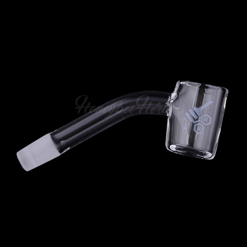 A close-up, angled view of the THICK ORIGINAL QUARTZ BANGER - 45° DEGREE  YL, showcasing its clear quartz construction and angled joint.