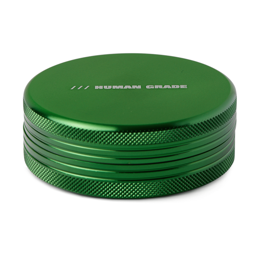 Front view of the Human Grade Grinder 1C (2.5") with a metallic finish, showcasing its two-piece construction.