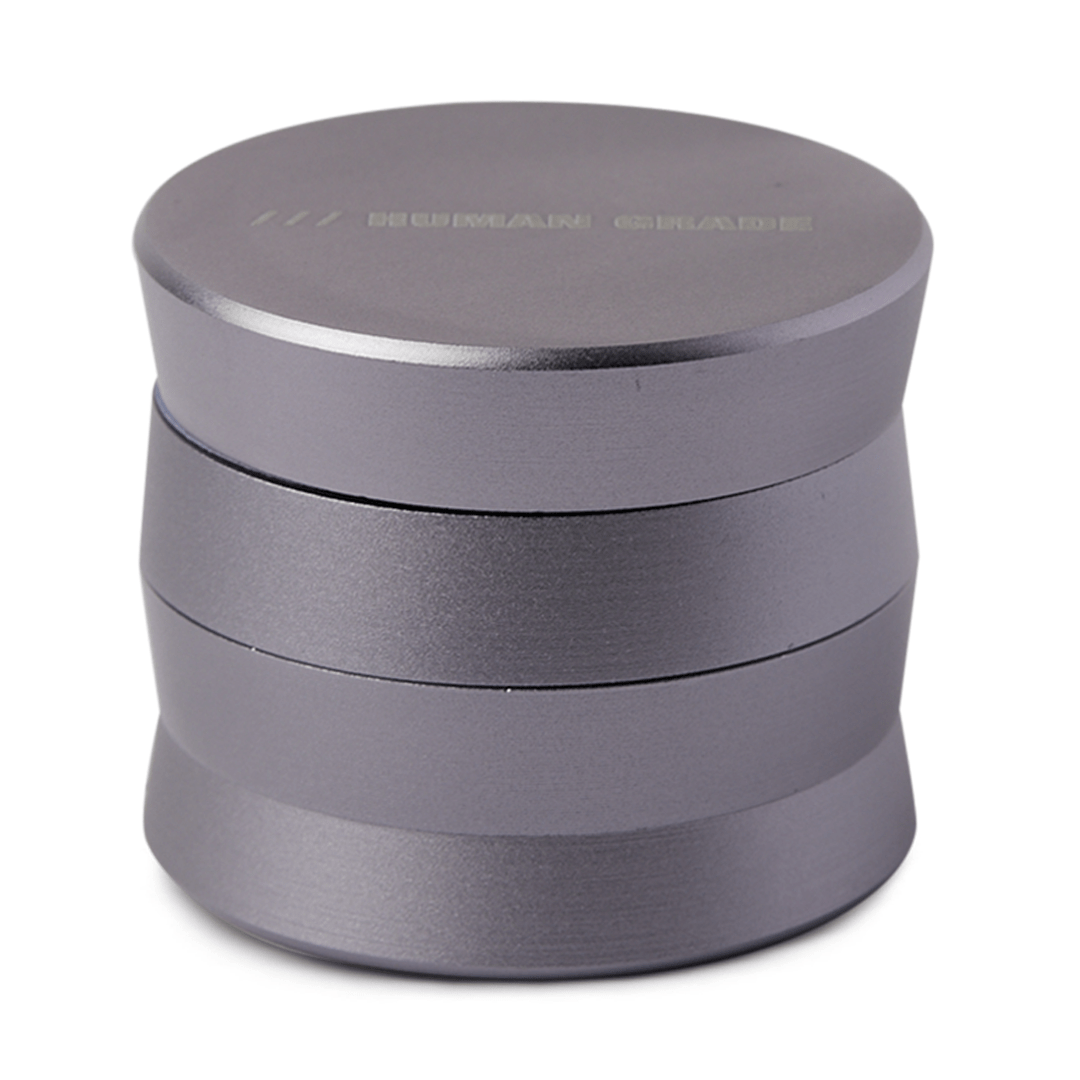Front view of the Human Grade Grinder 3A (2" 4-Piece) with a metallic gray finish, captured in a studio lighting setup.