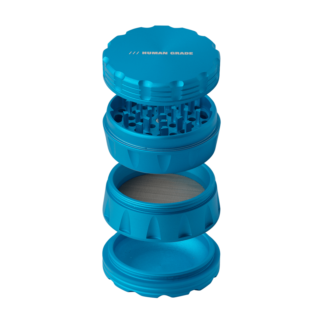 A front view of the Human Grade Grinder 2A (2.5" 4-Piece) with a sleek, blue, four-part design, isolated on a white background.