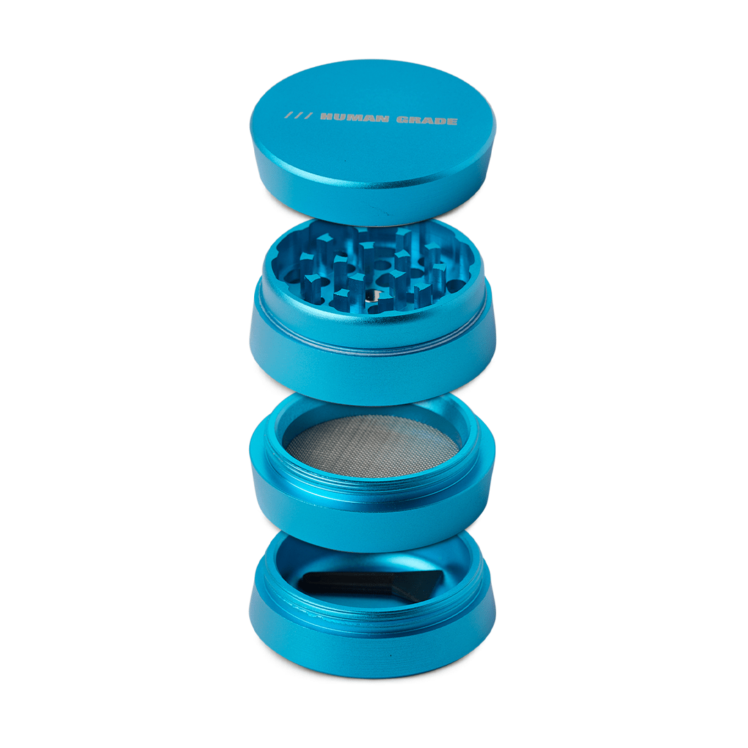 A top-down view of the Human Grade Grinder 3A (2" 4-Piece) showing its four blue sections stacked together.
