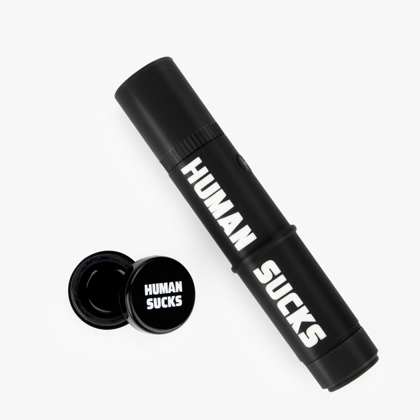 A close-up, top-down view of the HUMAN SUCKS STINGER 2| showing its cylindrical shape and smooth, black finish.