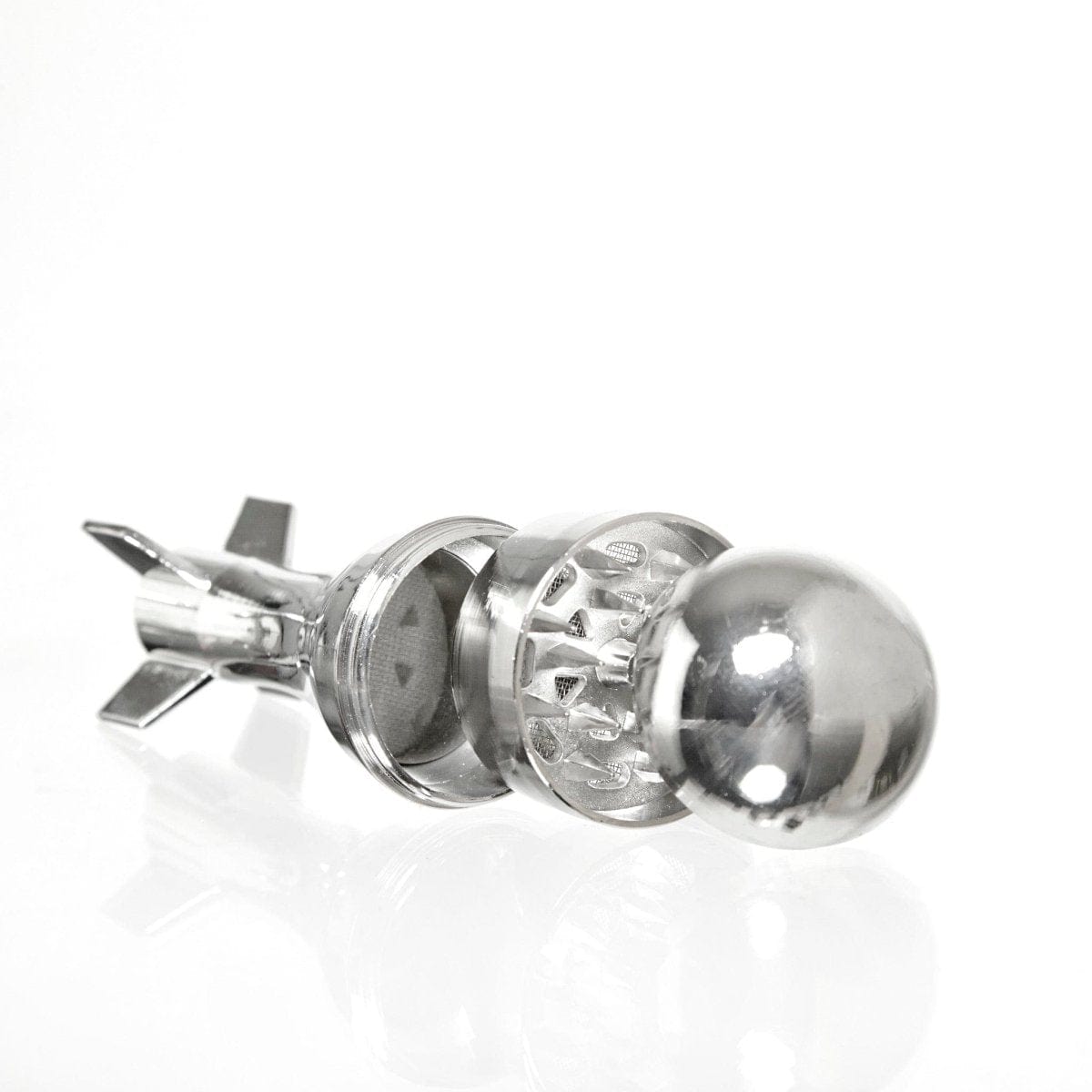 A close-up side view of the First Aid Smoking Kit, showcasing its metallic construction and detailed, intricate design.