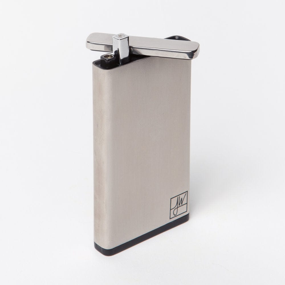 Close-up view of The Classic, showcasing its metallic finish and minimalist design against a neutral background.