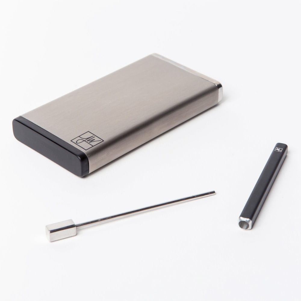 A straight-on view of The Classic, showing its smooth, dark exterior and minimal design.