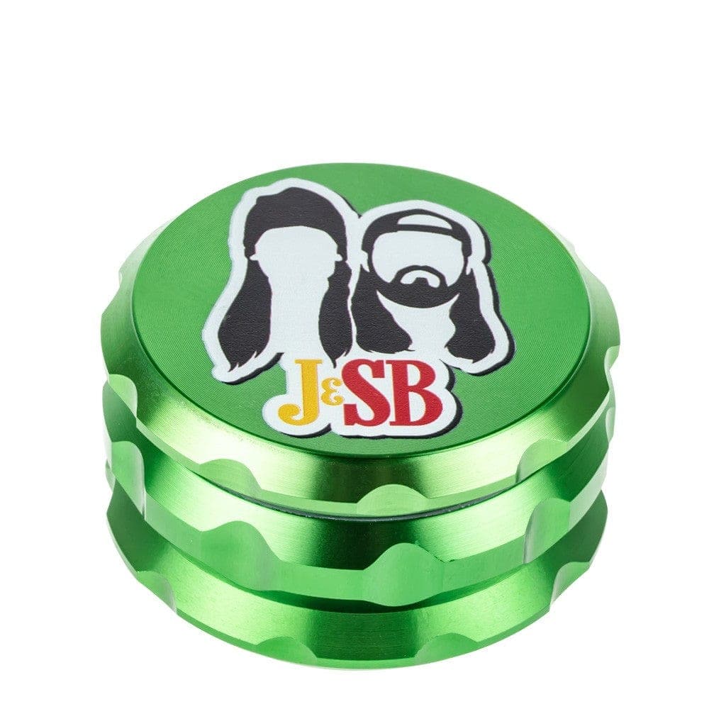 Close-up of the Jay and Silent Bob Grinder, a metallic green grinder with a multi-tiered, cylindrical shape.