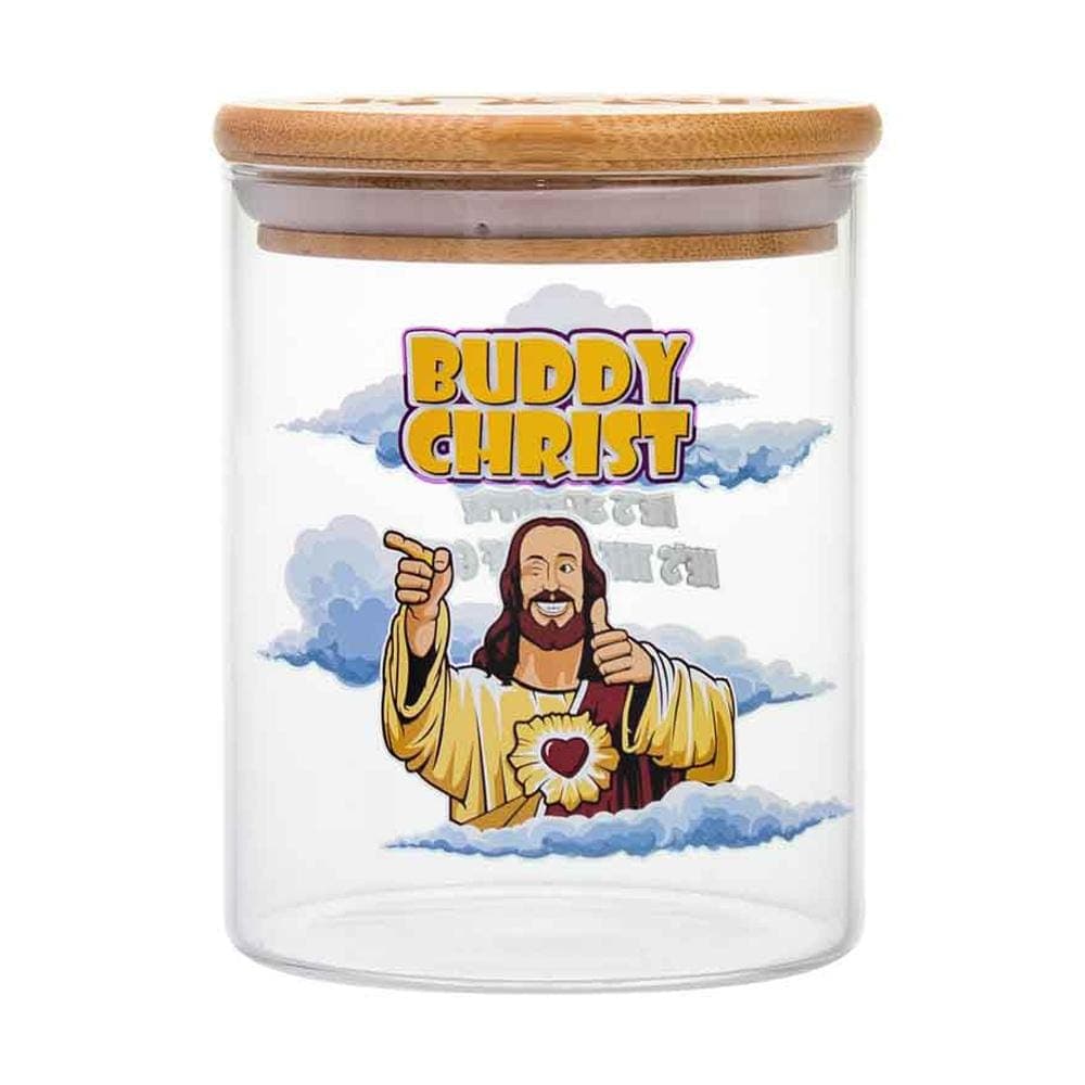 A front view of the Buddy Christ Stash Jar depicts a ceramic jar with a playful depiction of Jesus on the front.