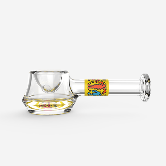A studio shot of the K.Haring Spoon Pipe, showing the clear glass bowl from a slightly above angle against a white backdrop.