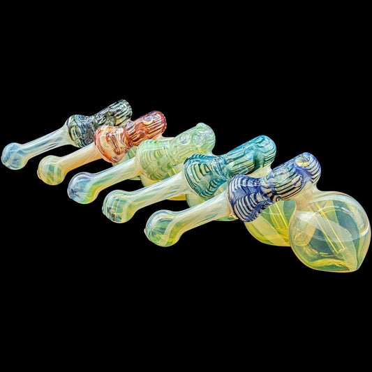 A group of various colored “Raked Hammer” Fumed Hammer Bubbler Pipes are displayed from a slightly above angle on a black background.
