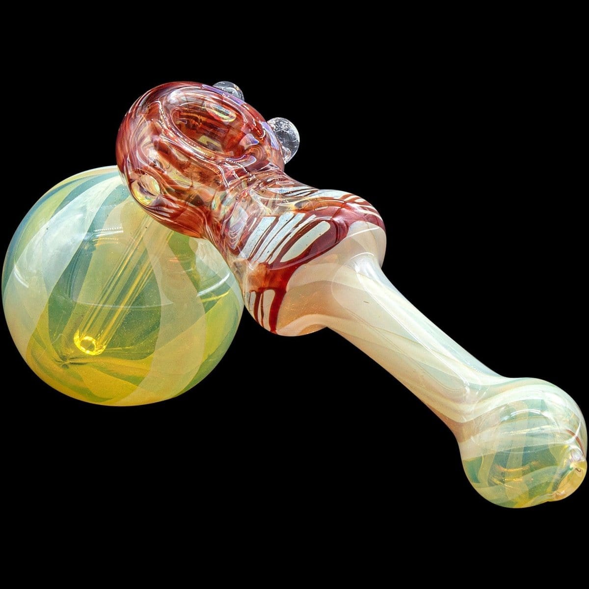 A studio shot of the “Raked Hammer” Fumed Hammer Bubbler Pipe, showing its colorful glass form from a slightly angled, top-down perspective.