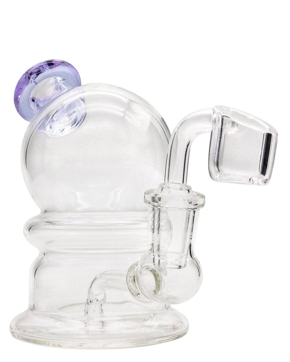 The Nano Globe Rig is displayed in a side view, showcasing its clear glass construction and compact, rounded form.