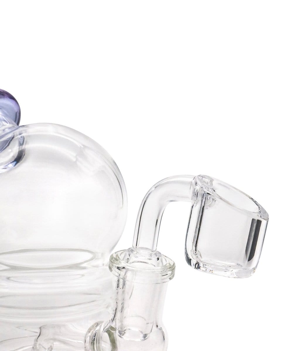 Close-up of the Nano Globe Rig’s clear glass joint, angled against a plain white background.