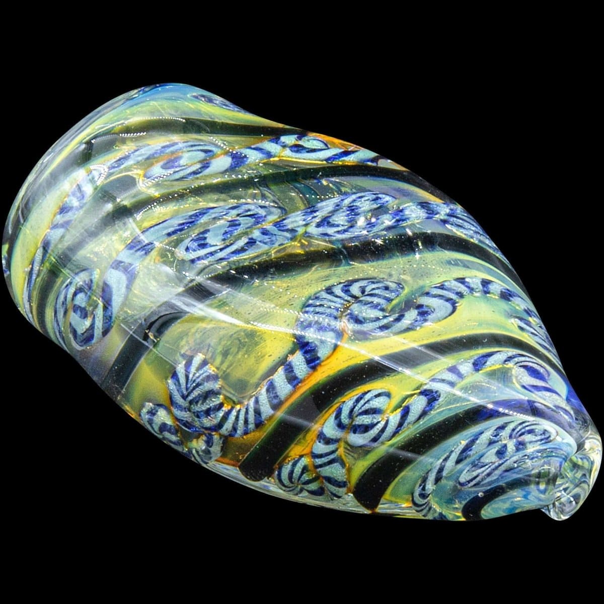 A close-up, angled view of the “Skipping Stone” Inside-Out Chillum, showcasing its colorful, swirled glass design.