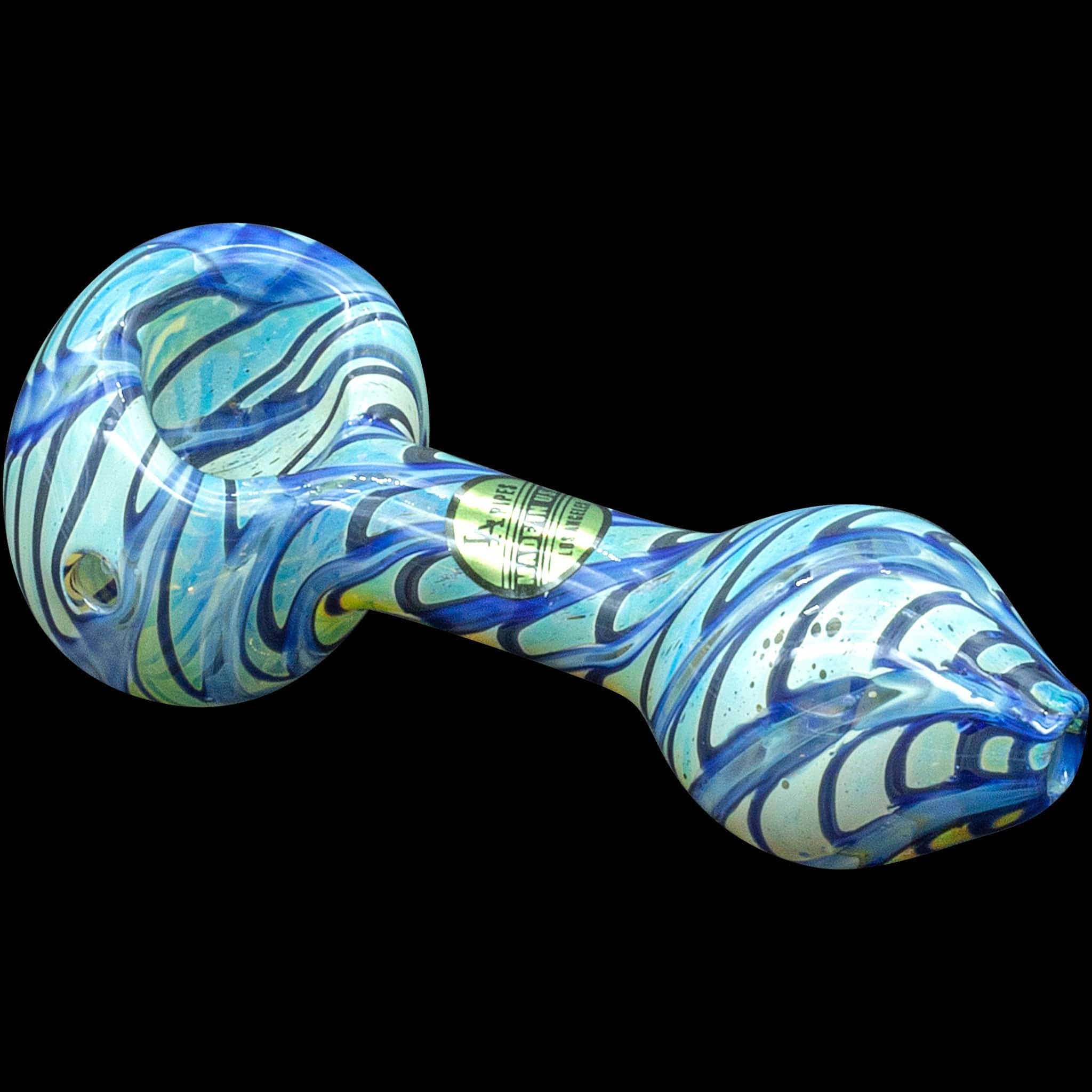 A front view of the “Raker” Glass Spoon Pipe showcases its swirling blue and white glass design.