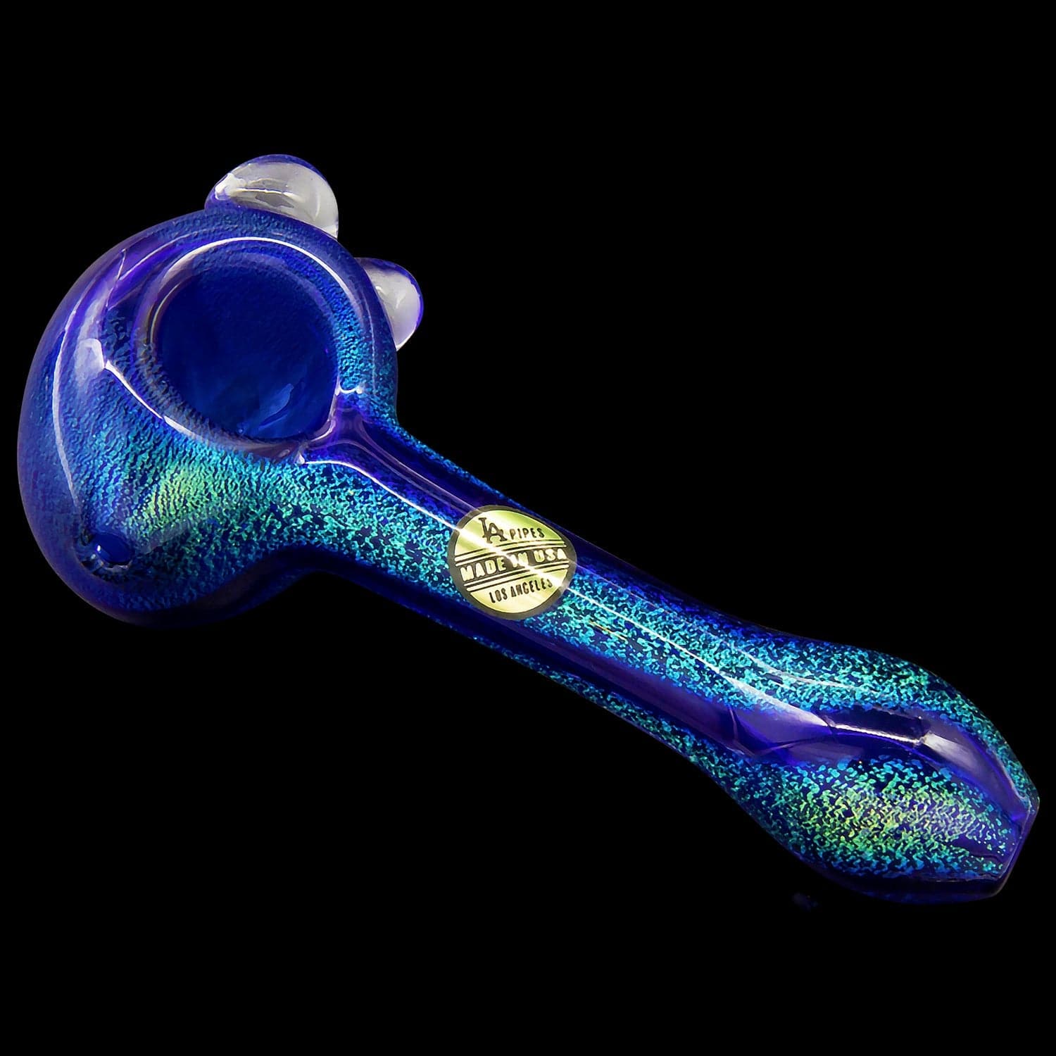 A side view of the “Galactic Storm” Full Dichro Spoon Hand Pipe, showcasing its vibrant, swirling blue and purple glass design.