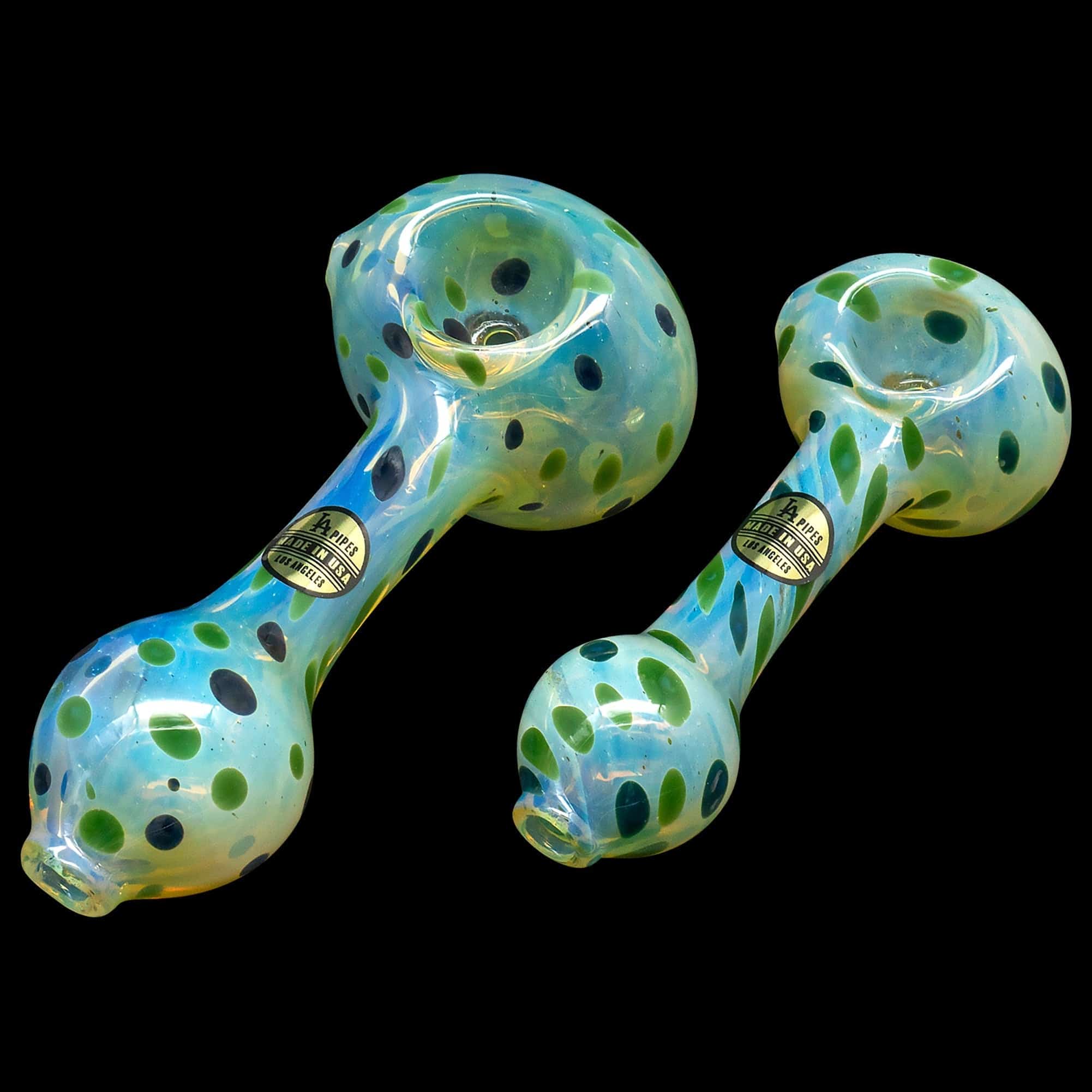 A slightly angled view of the “Polka Dot” Glass Spoon Pipe, showing colorful dots on a clear glass body.