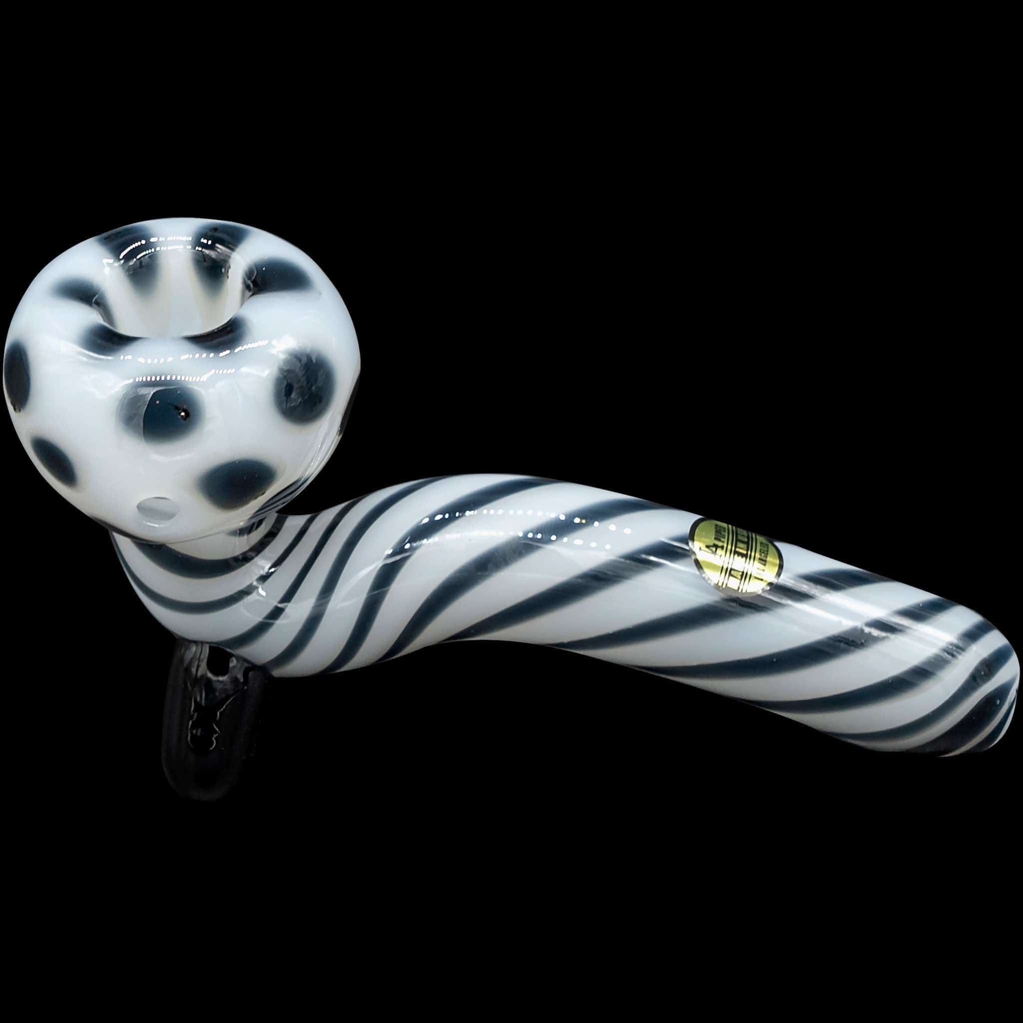 A side view of the “Ivory Locks” Bone White Sitting Sherlock Glass Pipe, showing its curved design and smooth, white finish.