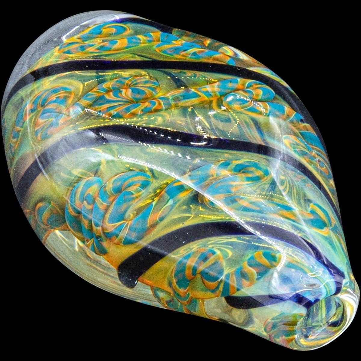 A close-up shot of the “Skipping Stone” Inside-Out Chillum, displaying a colorful, swirling glass design against a black background.
