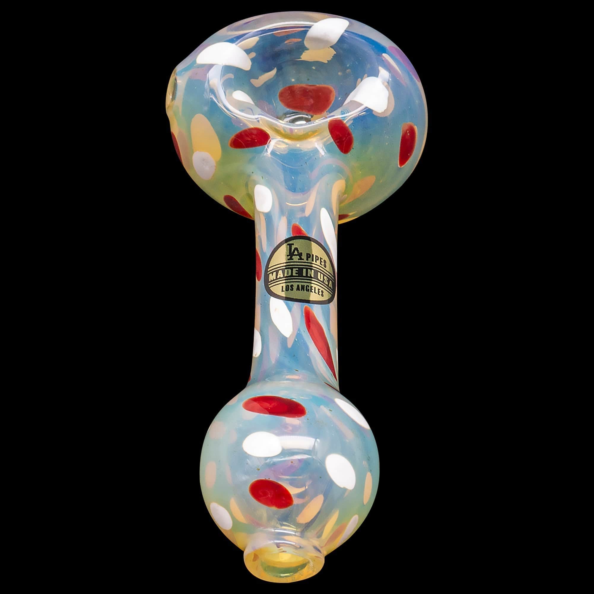 A close-up, angled view of the “Polka Dot” Glass Spoon Pipe, showcasing its colorful speckled pattern against a black background.
