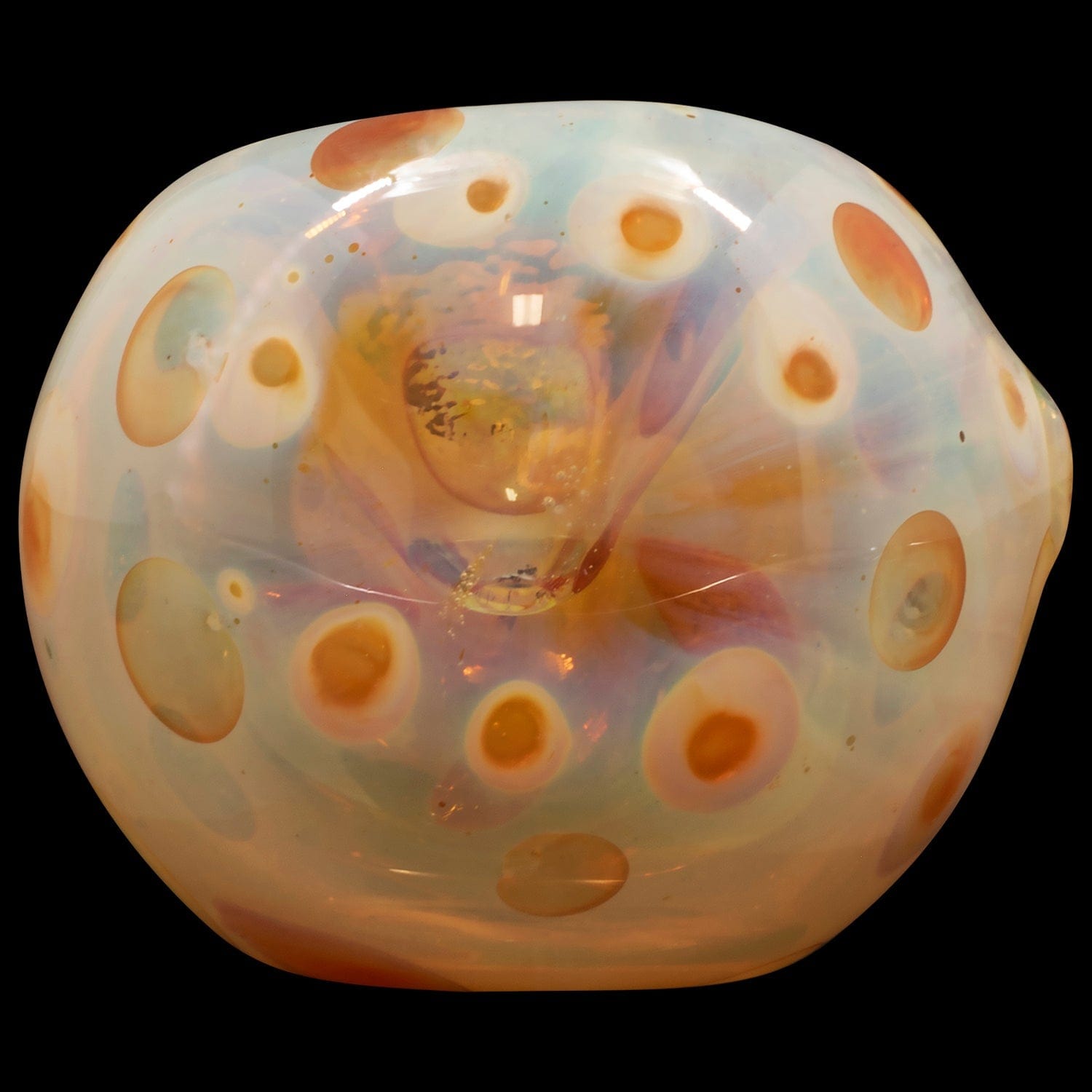 Front view of the “Polka Dot” Glass Spoon Pipe, showcasing a colorful glass piece with raised circular dots against a dark background.