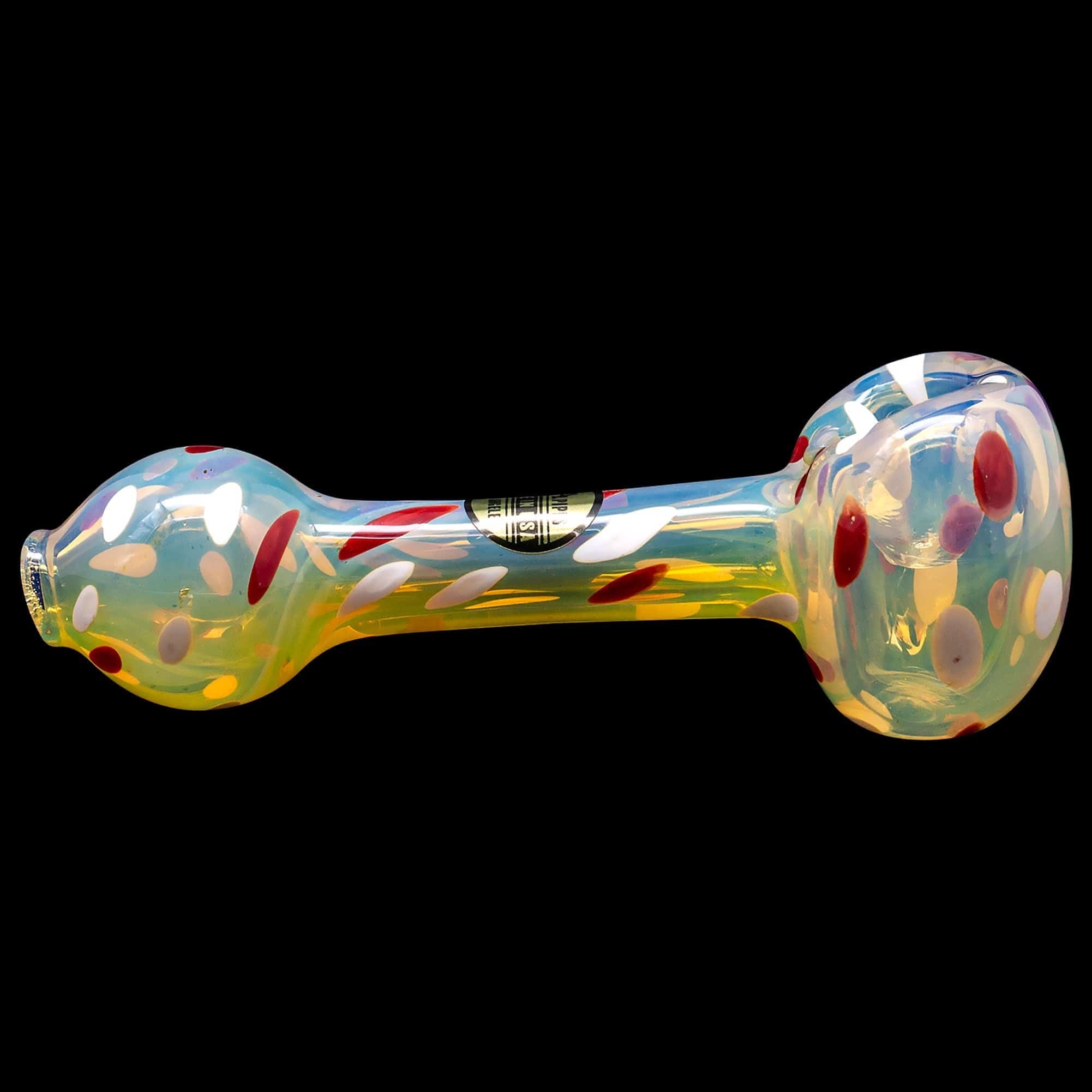 A studio shot of the “Polka Dot” Glass Spoon Pipe, displaying its colorful speckled pattern against a black background.