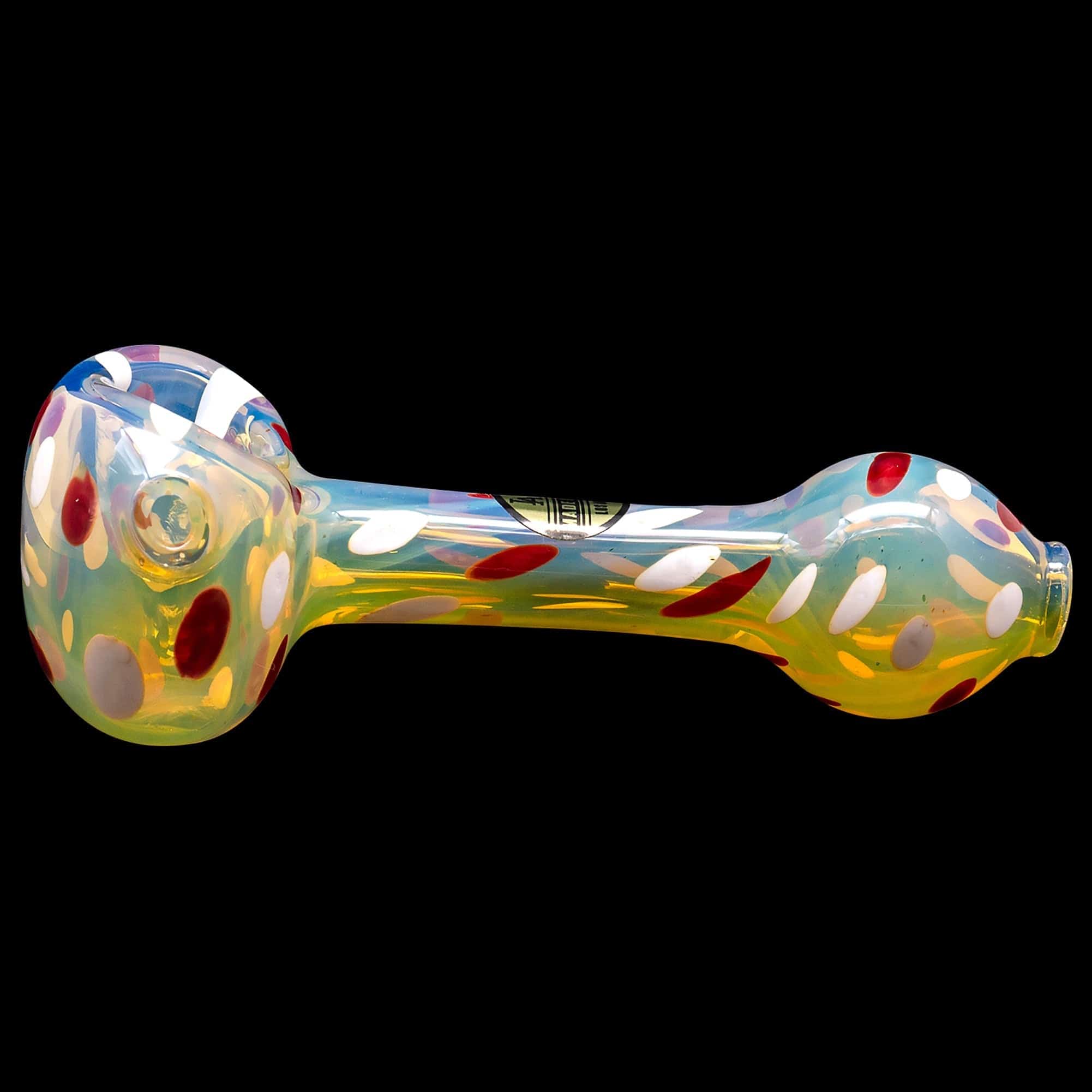 A side view of the “Polka Dot” Glass Spoon Pipe with colorful speckled glass and a curved bowl.