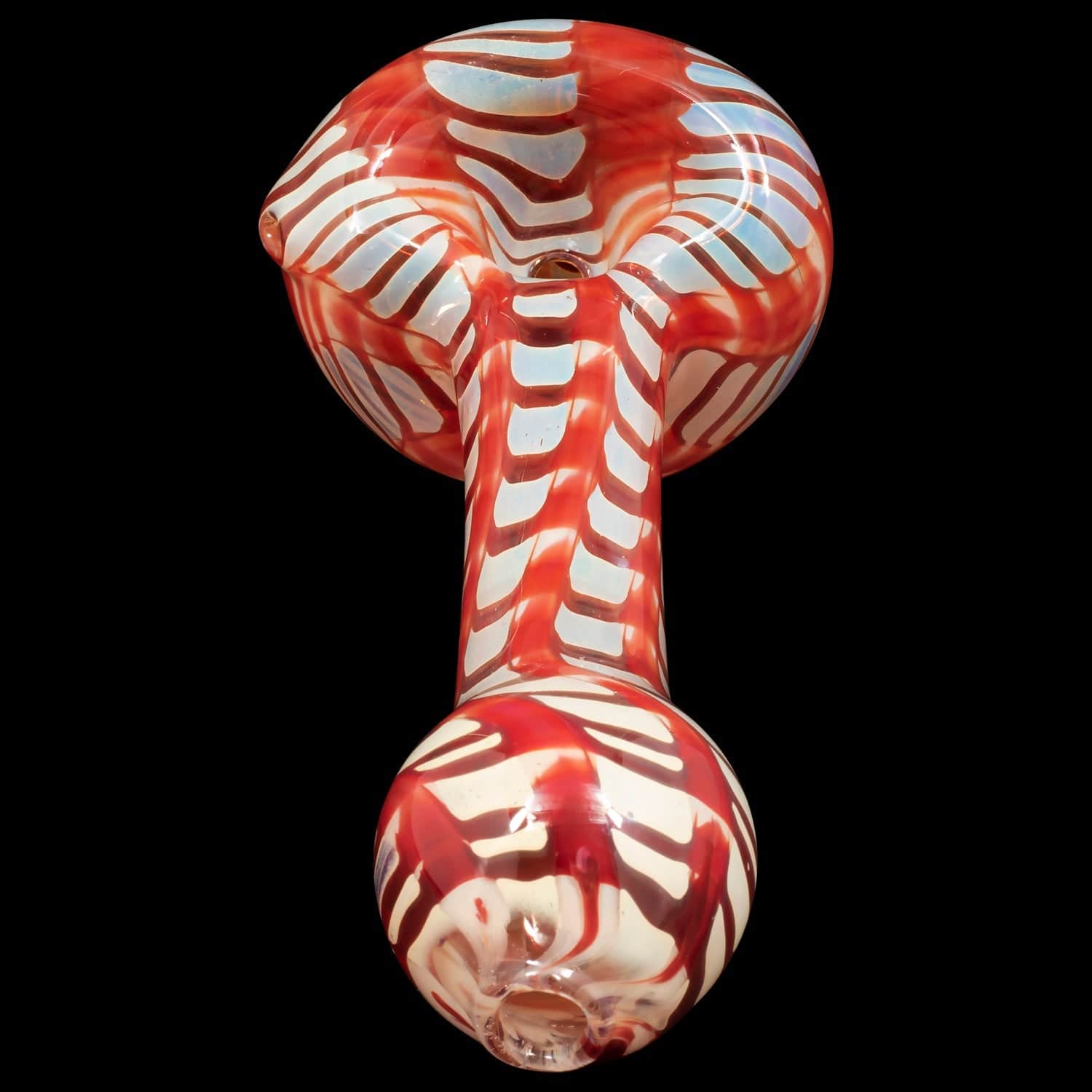 A close-up, angled view of the “Raker” Glass Spoon Pipe, showcasing its colorful swirl pattern against a dark backdrop.