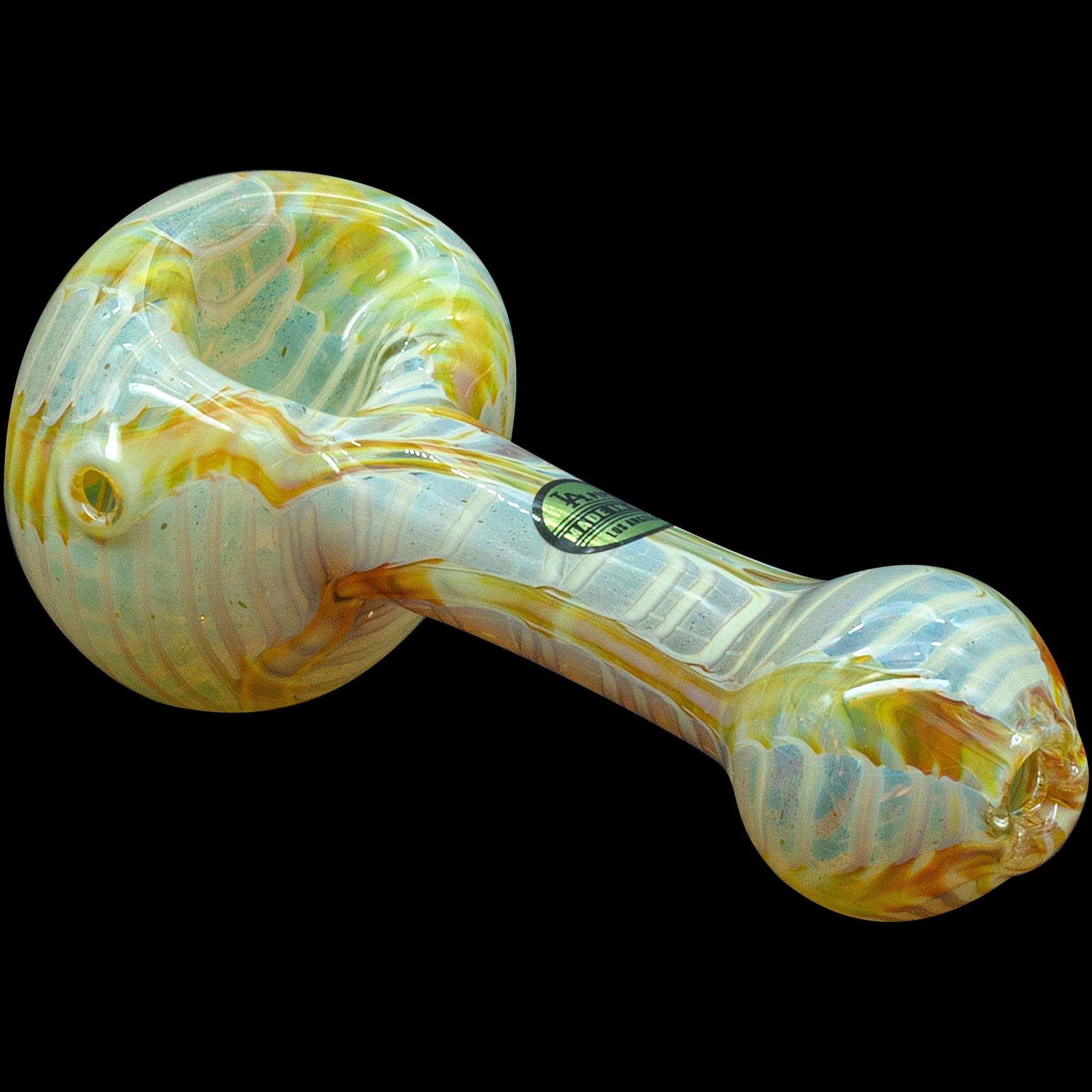 A close-up, angled view of the “Raker” Glass Spoon Pipe, showcasing its colorful marbled glass design against a dark backdrop.