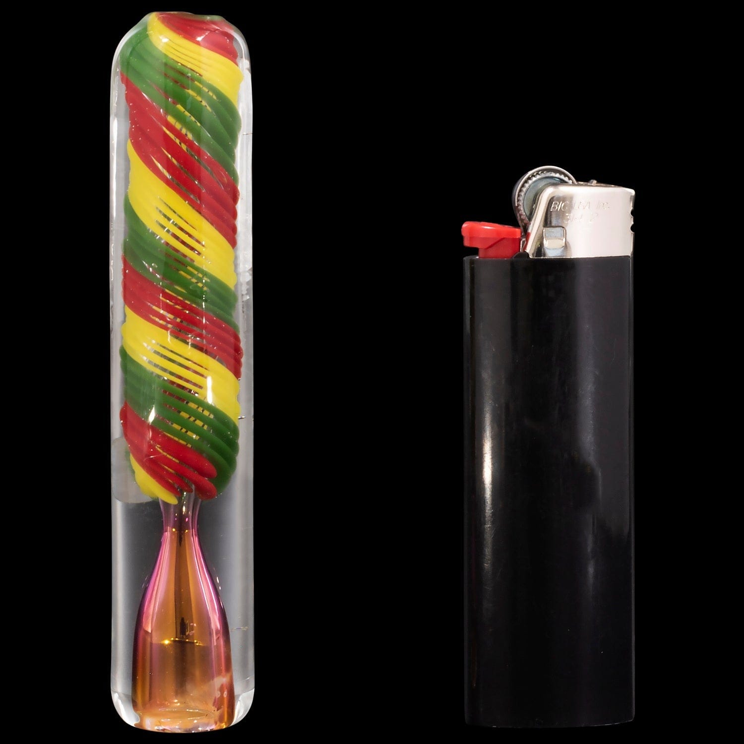 A front view of the "Rasta Twister" Chillum Pipe next to a lighter on a black background.