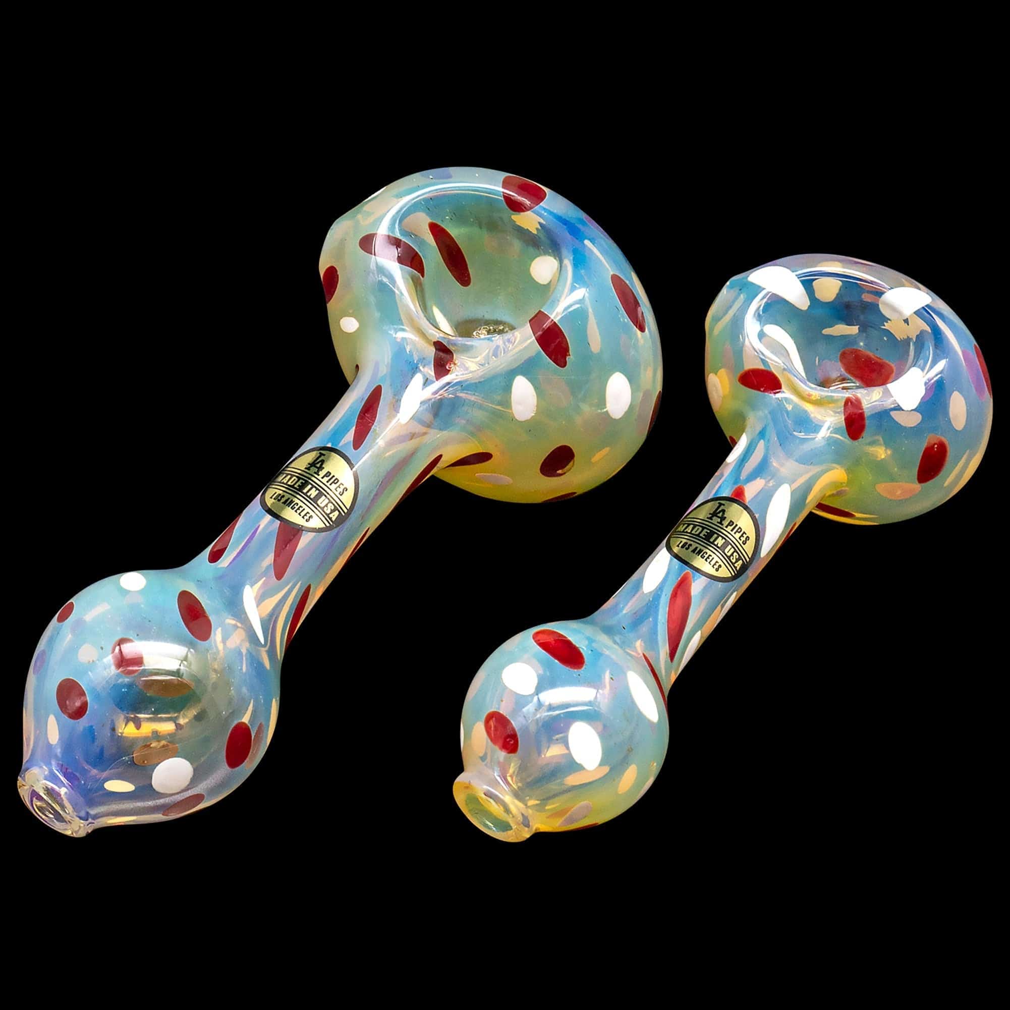 A close-up, angled view of the “Polka Dot” Glass Spoon Pipe, displaying a colorful, patterned glass design.