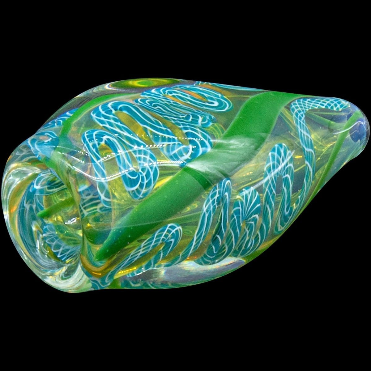 A close-up, angled view of the “Skipping Stone” Inside-Out Chillum, featuring translucent green glass with a swirling pattern.