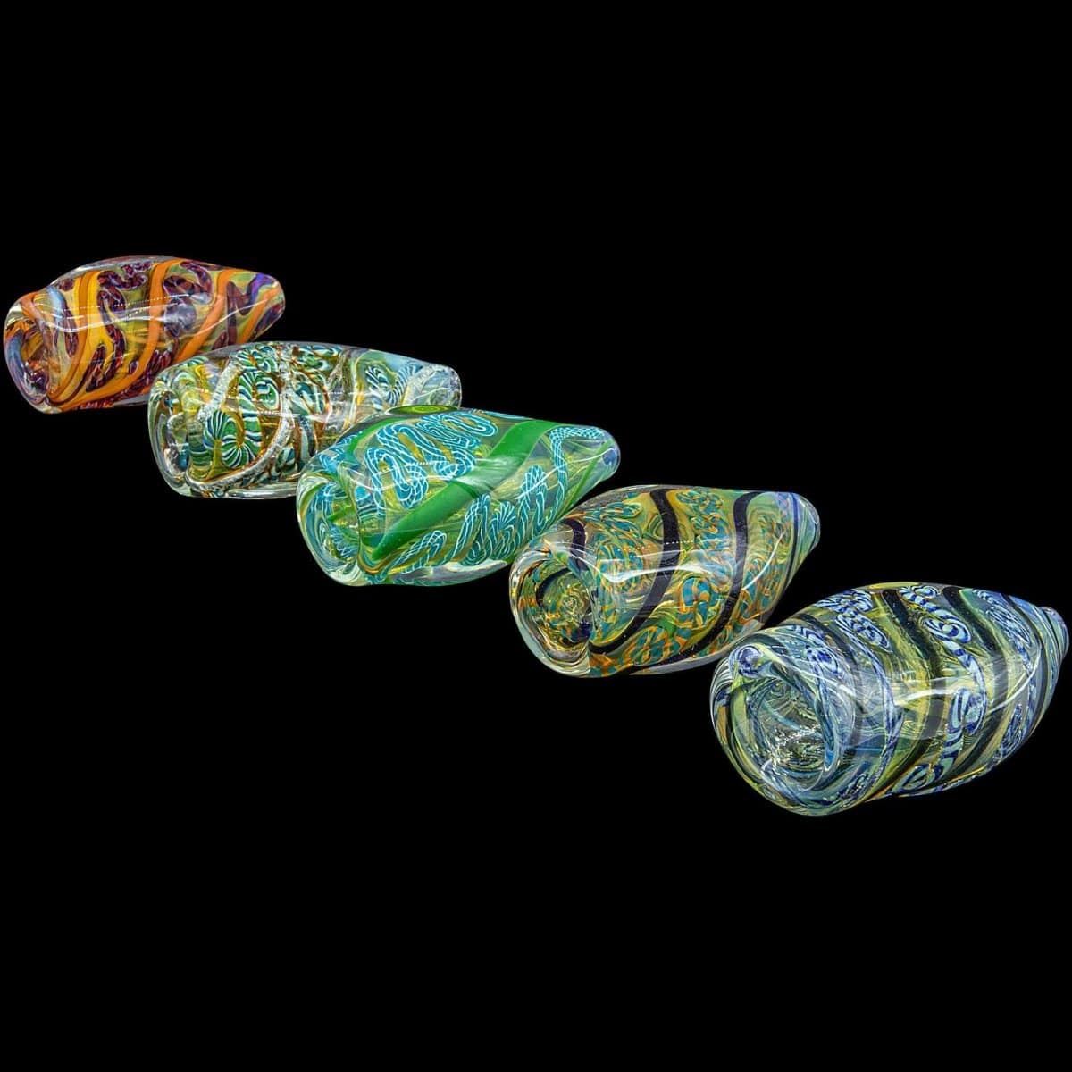 A close-up, angled view of the “Skipping Stone” Inside-Out Chillum, showcasing its colorful, patterned glass construction.