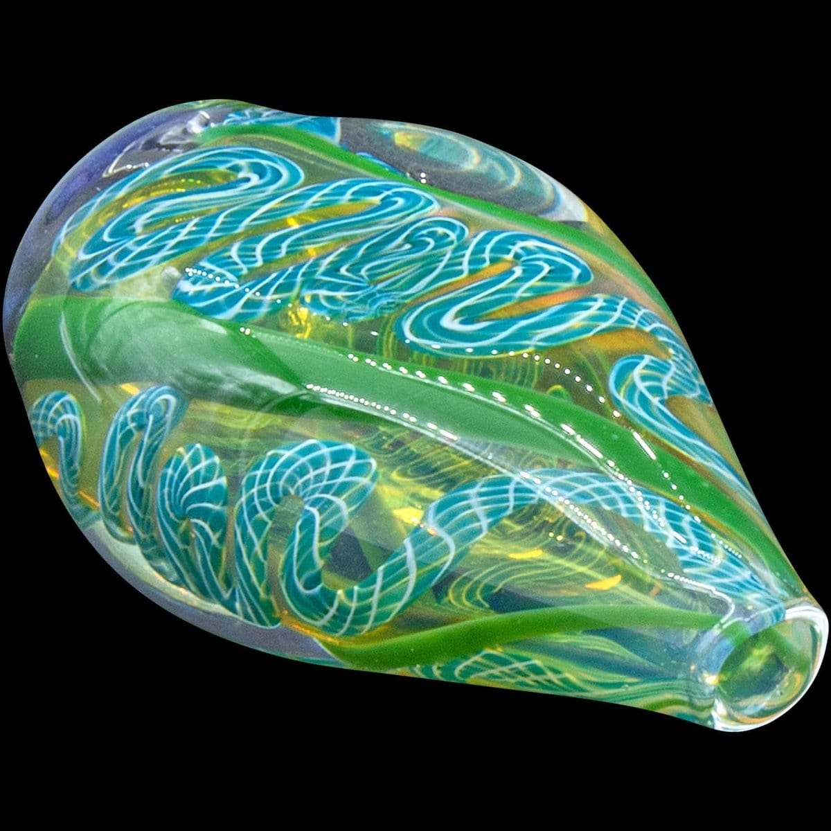 A close-up, angled view of the “Skipping Stone” Inside-Out Chillum, featuring swirling green and blue glass patterns.