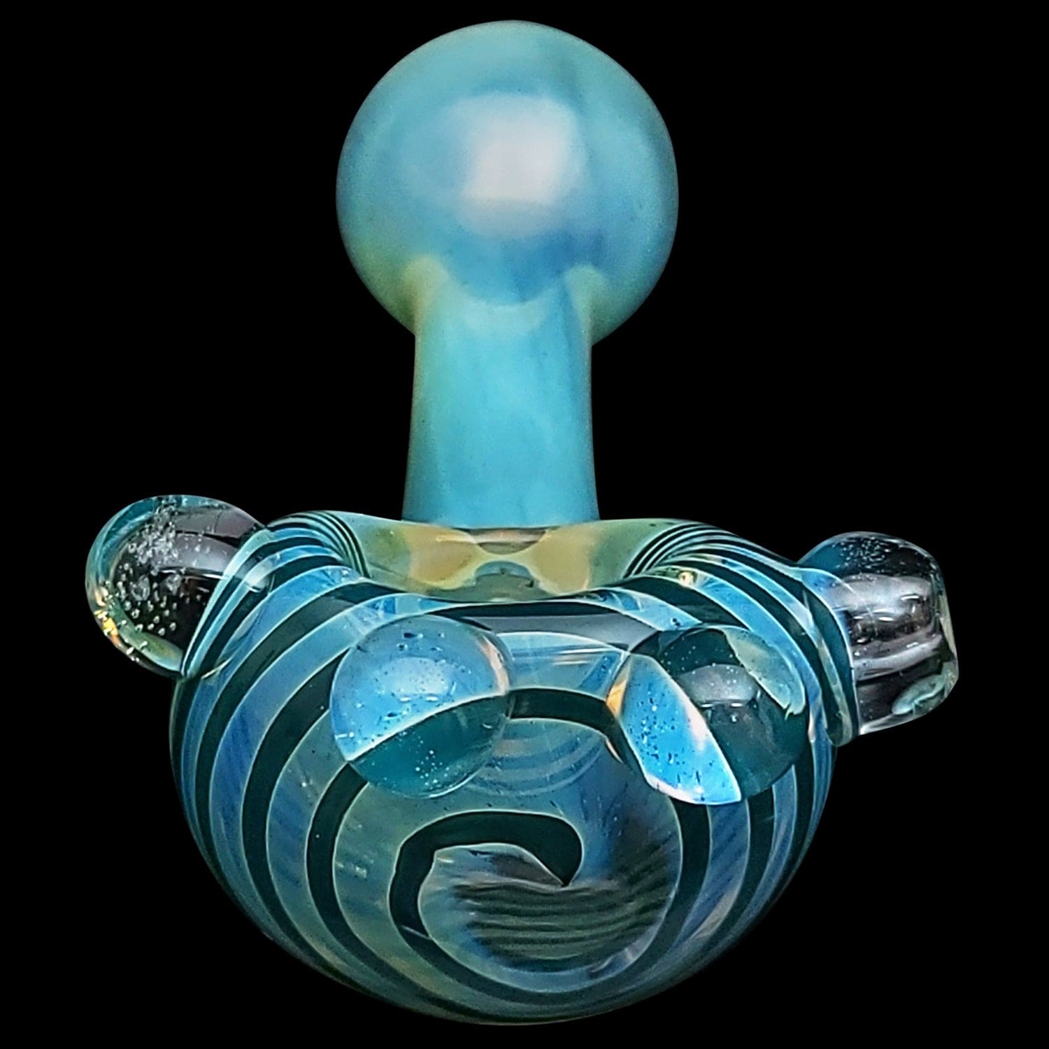 A close-up, angled view of the “Spiral Marble Head” Glass Spoon Pipe, showcasing its swirling, patterned glass design against a black background.