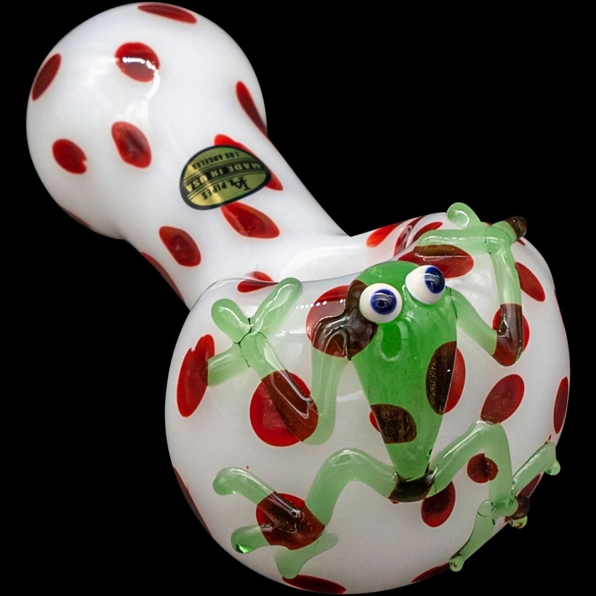 Front view of the “Spotted Poison Frog” Spoon Glass Pipe, featuring a vibrant, colorful frog design sculpted onto the bowl.
