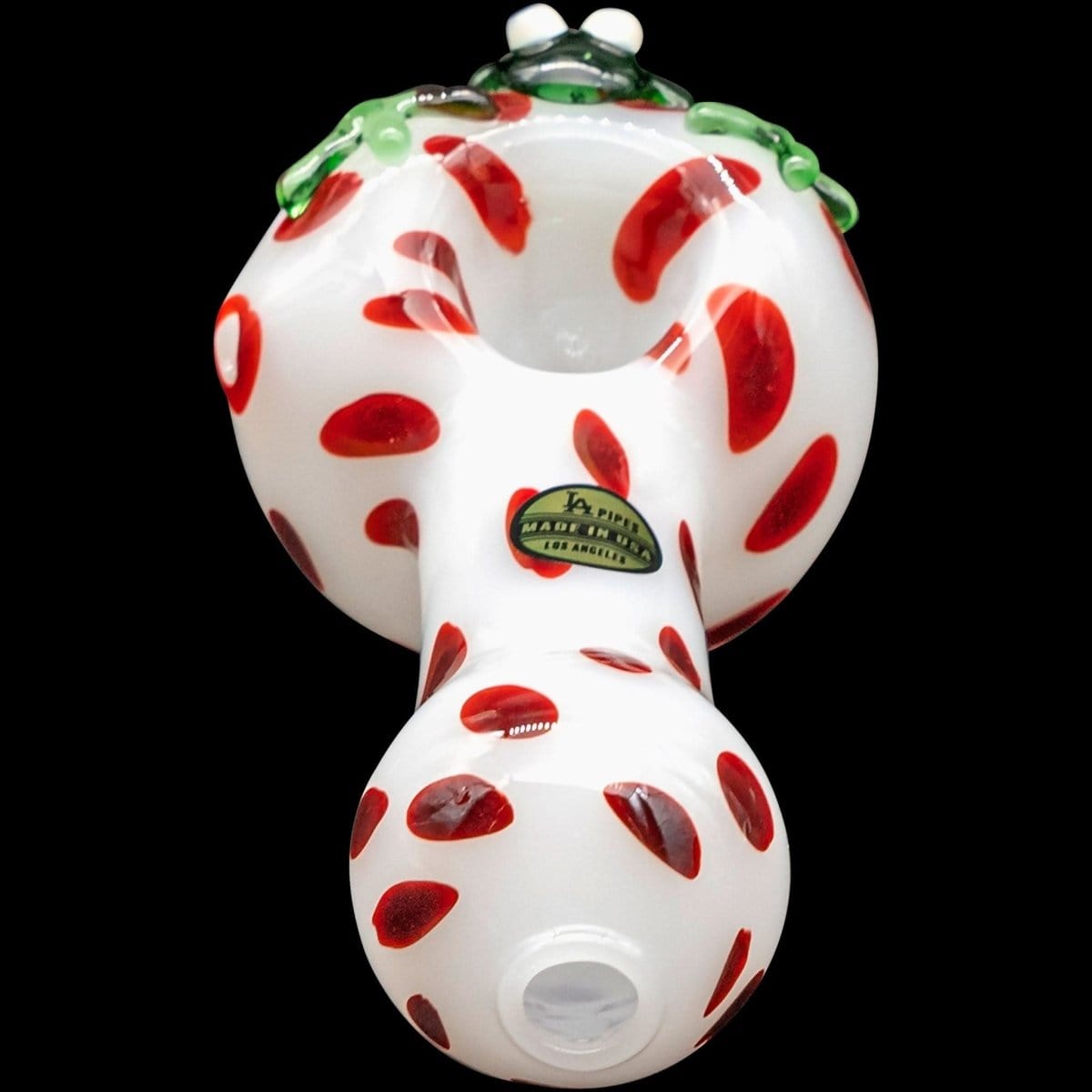 Front view of the “Spotted Poison Frog” Spoon Glass Pipe, showcasing a vividly patterned, colorful glass pipe.
