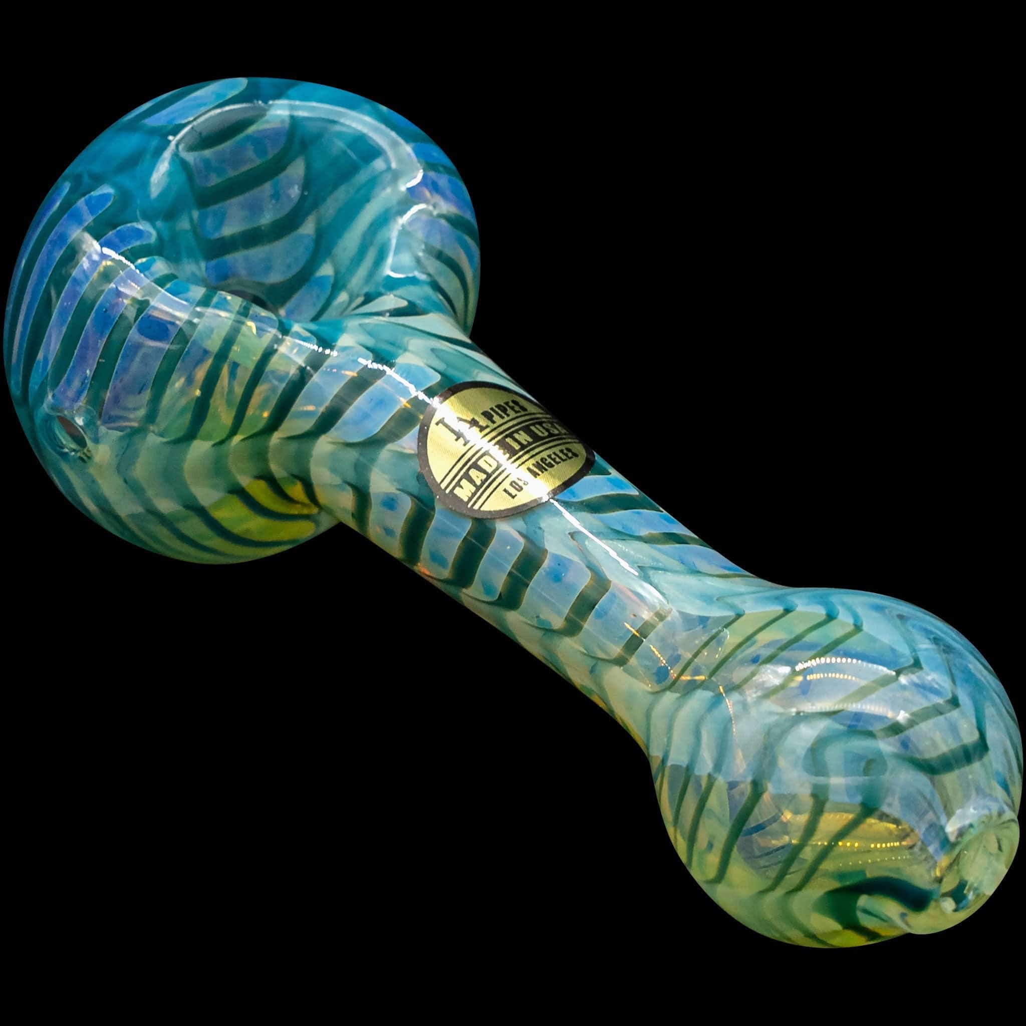 A three-quarter view of the “Raker” Glass Spoon Pipe, showcasing its blue and green marbled glass design.