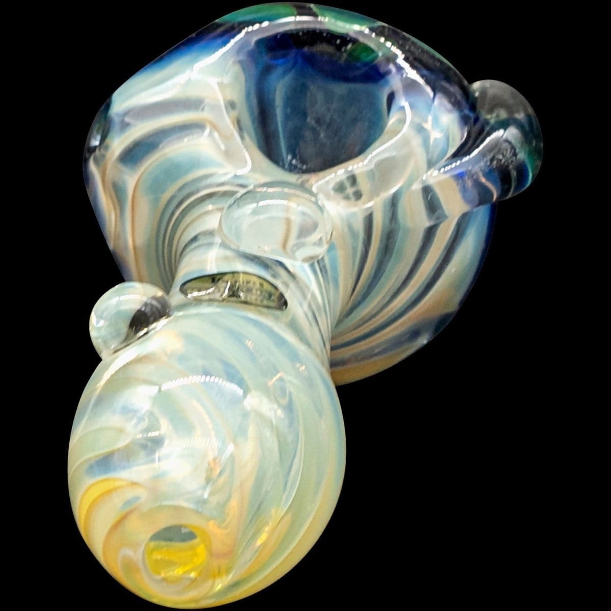 A side view of “The Hive” Honeycomb Color Changing Glass Pipe, showcasing its curved shape and iridescent color shift.